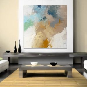 Blue and beige abstract painting in a modern living room setting.