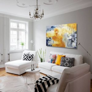 Bright abstract painting in a modern, light-filled living room.