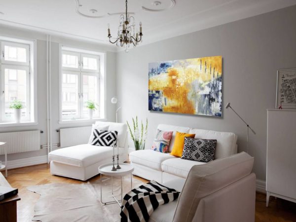 Bright abstract painting in a modern, light-filled living room.