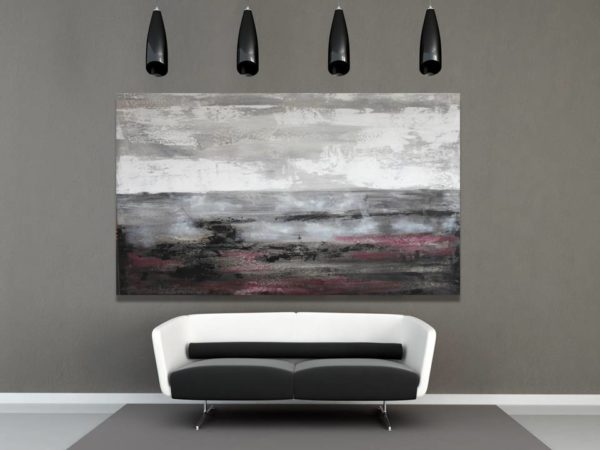 Gray abstract canvas art with hints of lilac above a modern sofa.