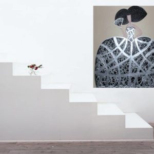 Silver and black painting in a modern living space.