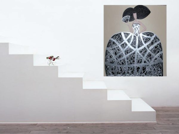 Silver and black painting in a modern living space.