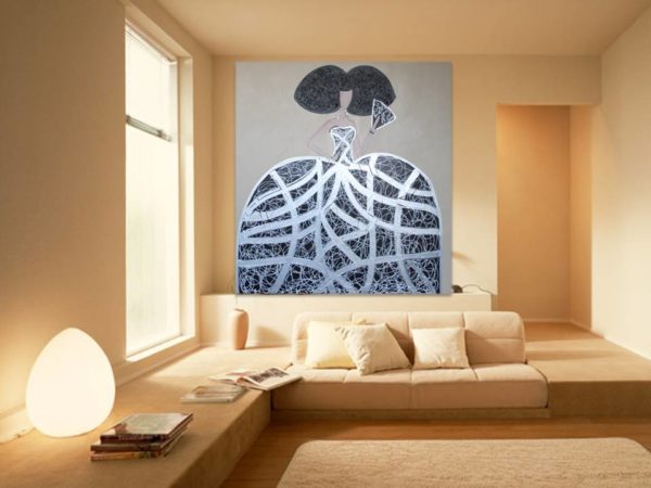 Silver and black "Menina A2" painting in a modern living space.