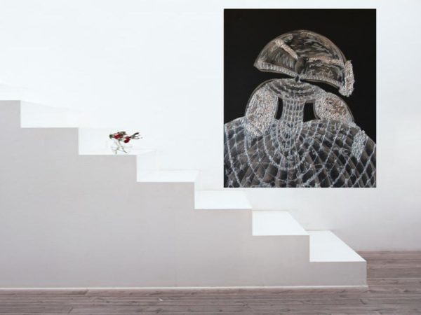 Silver and black painting in a modern living space.