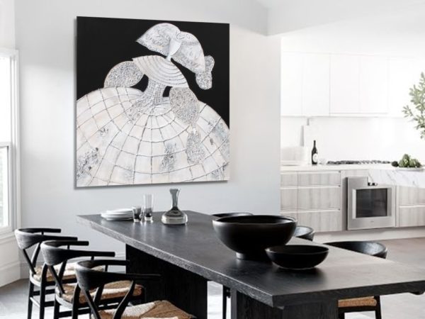 Silver and black painting in a modern living space.