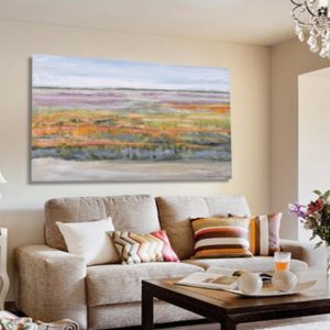 Bright living room with magenta abstract painting and cozy modern decor.