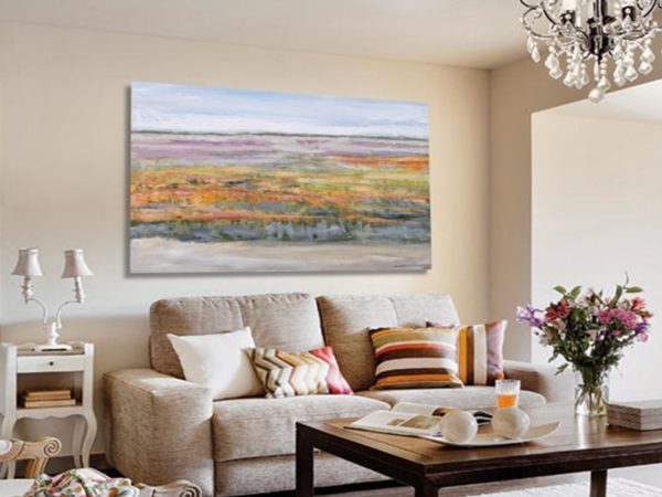 Bright living room with magenta abstract painting and cozy modern decor.