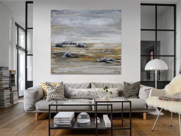 Abstract painting in a Greek-style outdoor dining area.