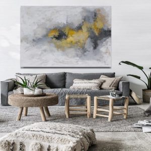 Abstract painting in a Greek-style outdoor dining area.