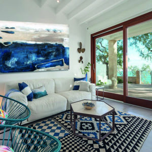 Abstract blue and beige painting in a living room in Ibiza.