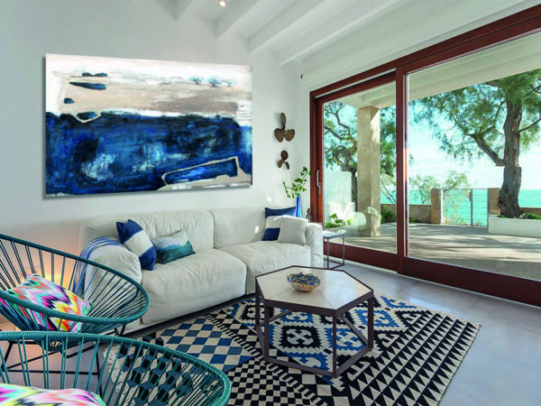 Abstract blue and beige painting in a living room in Ibiza.